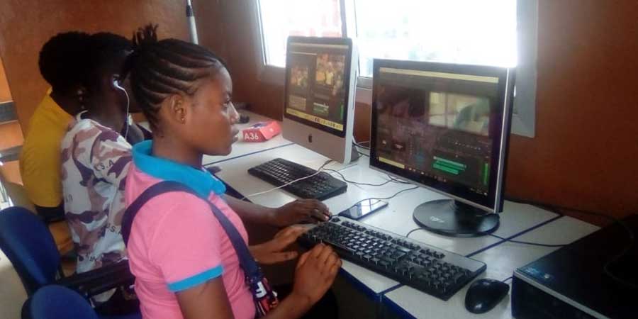Children learning how to edit movies